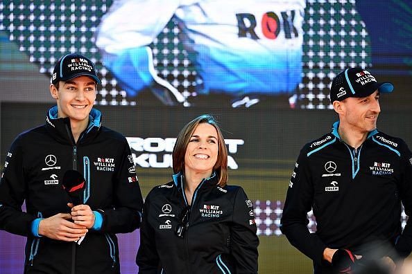 George Russell(l), and Robert Kubica(r) with Deputy Team Principal, Claire Williams