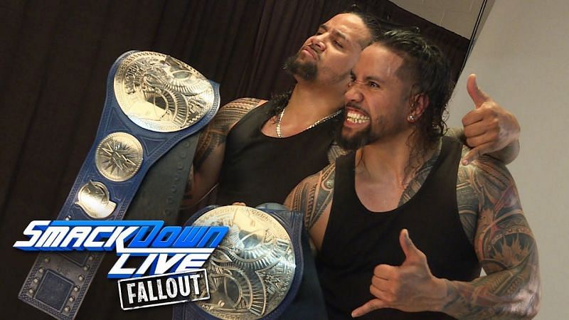 The Usos celebrating with the SmackDown Live Tag Team Championship