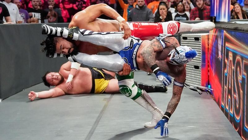 Rey Mysterio and Andrade in action