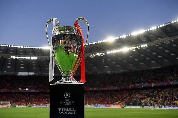 Lionel messi lifting the 2018/19 champions league trophy for barcelona  against tottenham