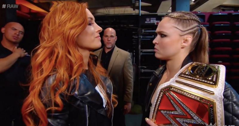 Becky Lynch faces off with Ronda Rousey backstage at Raw.