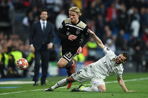Real Madrid v Ajax - UEFA Champions League Round of 16: Second Leg Lucas V&Atilde;&iexcl;zquez looks in agony against Ajax