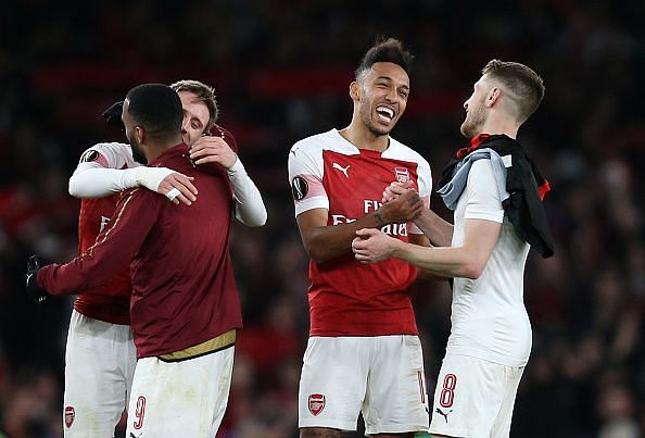 Arsenal celebrate their win against Stade Rennais in the UEFA Europa League Round of 16: Second Leg