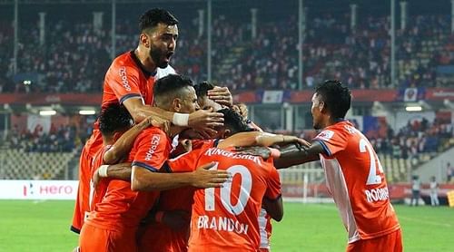 Goa players celebrate after Corominas' goal