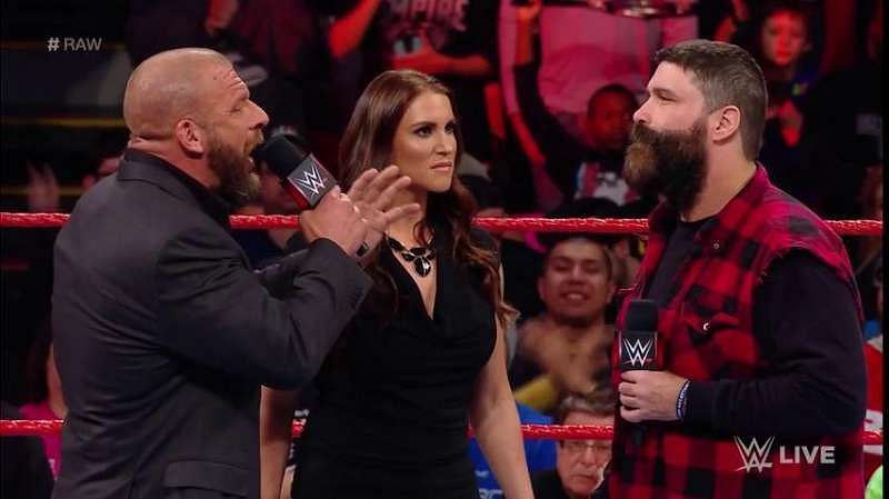 Triple H and Stephanie McMahon indulge in a heated session with Mick Foley