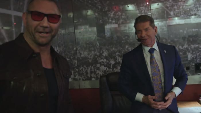 Batista and Vince McMahon backstage.