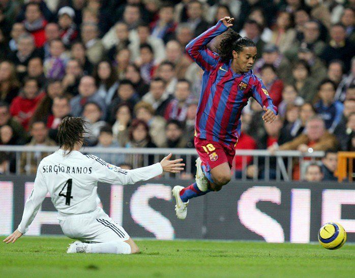 Ramos grounded: Ronaldinho is on the way to scoring one of the most spectacular solo-goals in football