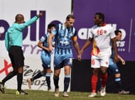 Mahmoud Al Amna (centre) of Minerva Punjab