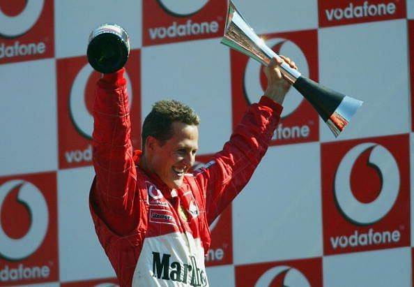 Schumacher of Germany and Ferrari celebrates a win at Monza