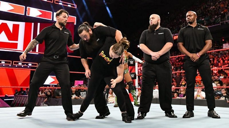 Becky Lynch, Charlotte Flair and Ronda Rousey versus security. Who wins?