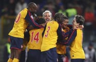 Arsenal players celebrate after winning on penalties