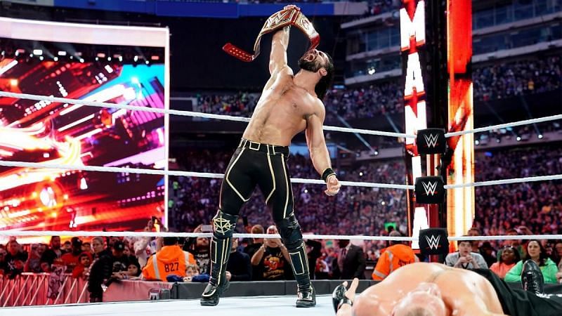 Seth Rollins celebrates after claiming the Universal title