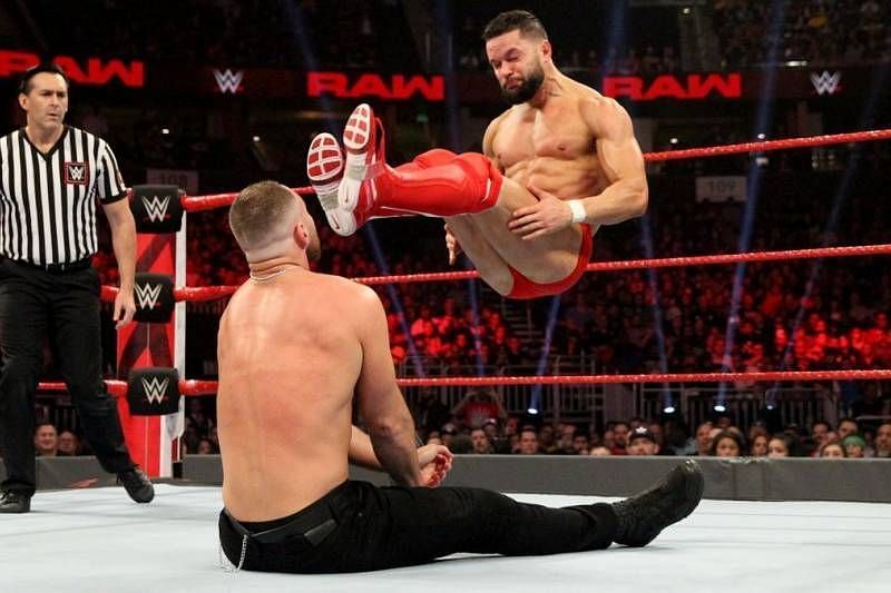 Finn Balor and Dean Ambrose facing off on Raw