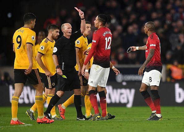 Ashley Young receives a red card