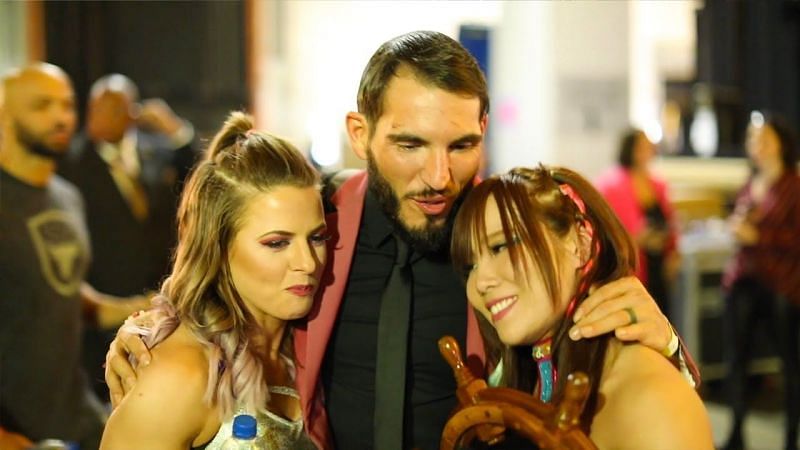 LeRae and Sane celebrate with Johnny Gargano after competing in Women&#039;s WrestleMania Battle Royal.