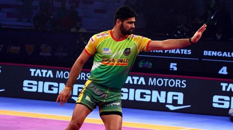 Monu Goyat, in green jersey, of Patna Pirates attempts to score a