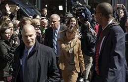 As celebs hit court in bribe case, 1 parent to plead guilty