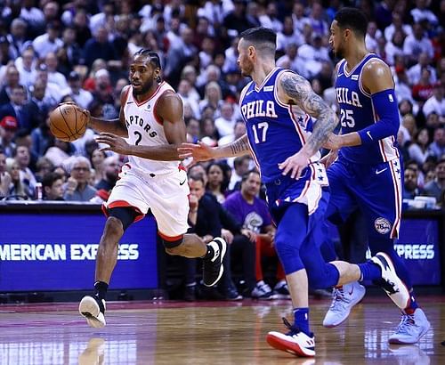 Kawhi Leonard, JJ Redick, and Ben Simmons in action