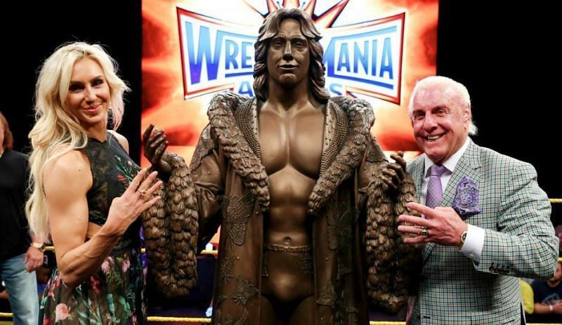 Charlotte posing with her father, Ric Flair
