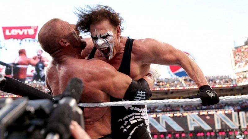 Why was Sting booked to lose his first WrestleMania match?