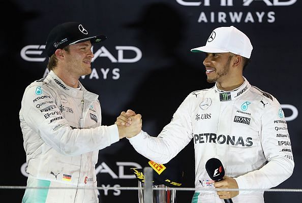 Nico Rosberg (left) won his only driver&#039;s title with the W07.