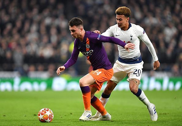 Laporte in possession with Alli lurking behind as Spurs adopted a successful pressing approach