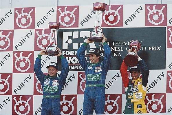 Aguri Suzuki (right) claimed his and Larrousse&#039;s only F1 podium in 1990.