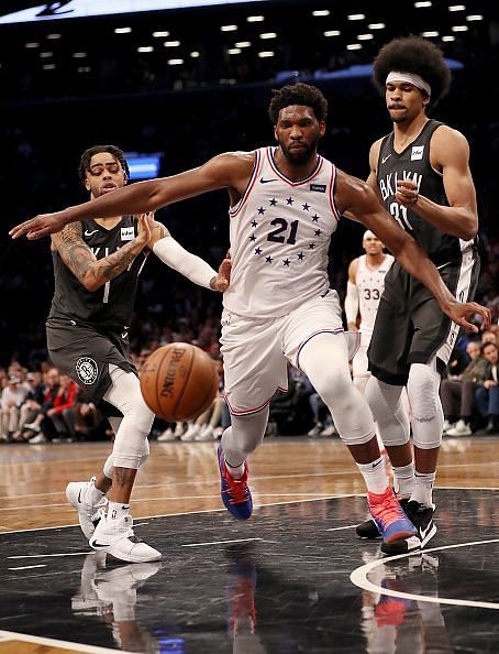 D&#039;Angelo Russell Joel Embiid and Jarrett Allen scampering for the ball