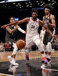 D'Angelo Russell Joel Embiid and Jarrett Allen scampering for the ball