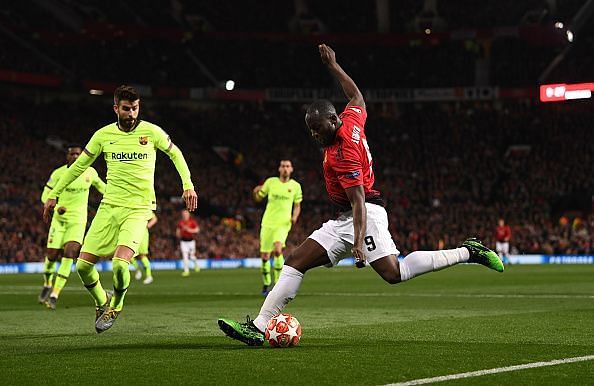 Gerard Pique and Romelu Lukaku