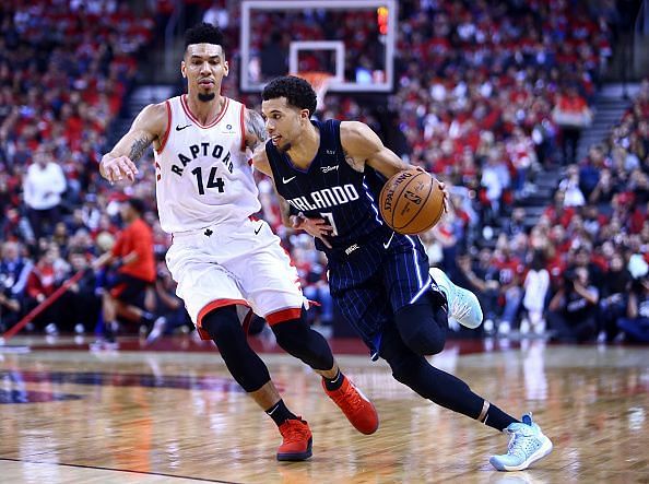 Toronto&#039;s Danny Green chasing Michael Carter-Williams of the Orlando Magic during Game One
