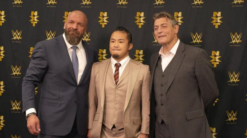 KUSHIDA with Triple H and William Regal