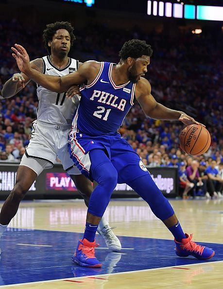 Ed Davis guarding Joel Embiid