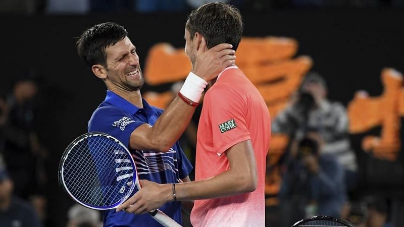 Novak Djokovic and Daniil Medvedev after their fourth round match at the Australian Open 2019.