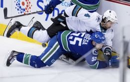 Canucks topple struggling Sharks 4-2