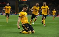 Wolverhampton Wanderers players celebrating a goal against Arsenal FC at Molineaux Stadium