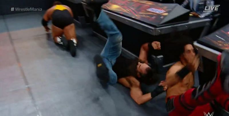 Ali smashed his head off the announce table