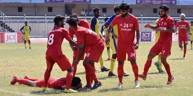 Punjab players celebrate after Harjinder Singh&#039;s goal against Goa during their Santosh Trophy semifinal