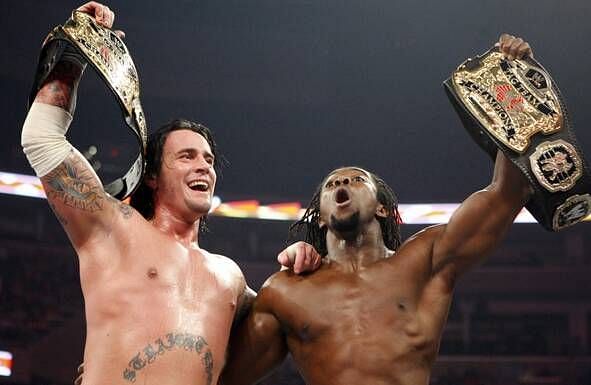 CM Punk and Kofi Kingston were tag-team champions once upon a time.