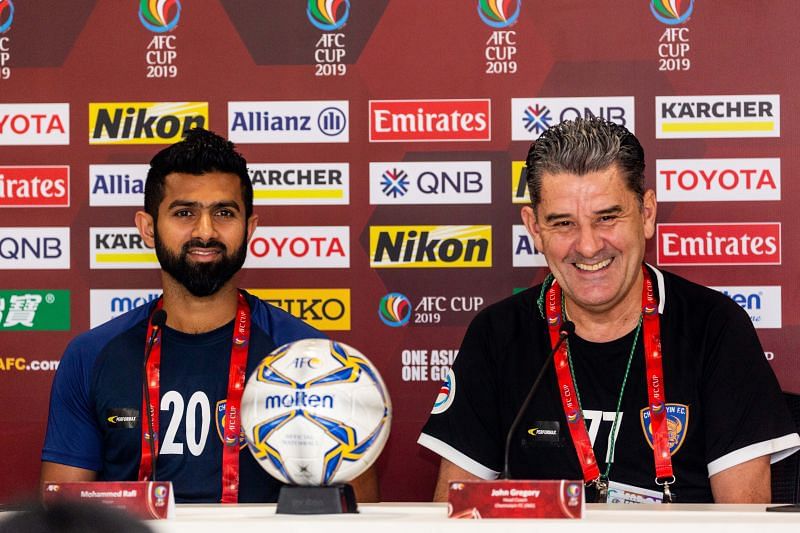 Chennaiyin coach John Gregory (right) with forward Mohammed Rafi at the pre-match press conference