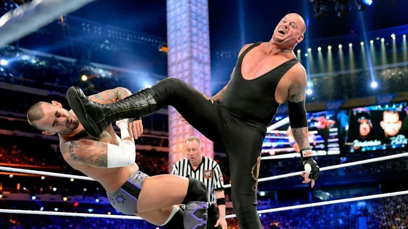 CM Punk wrestling with The Undertaker