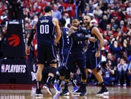 Orlando Magic players celebrate during their surprise Game One victory