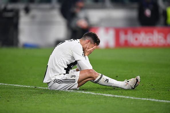 Cristiano Ronaldo cuts a dejected figure after being knocked out of UCL.
