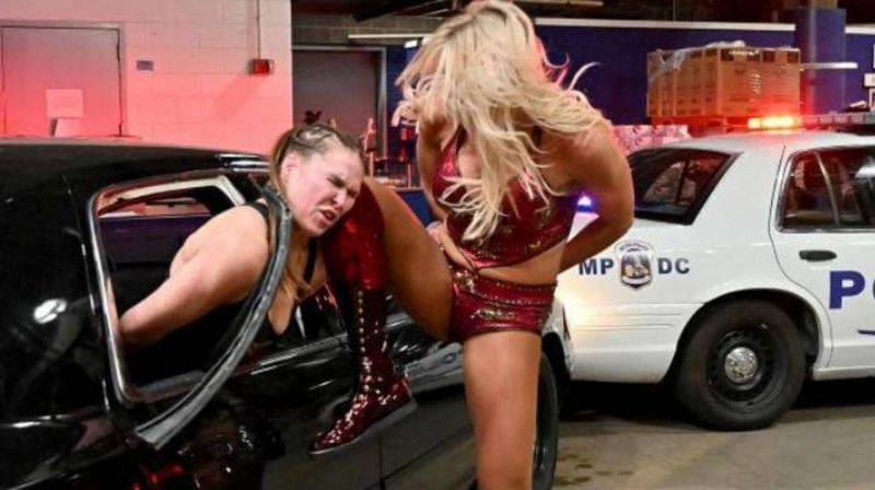 A handcuffed Charlotte Flair kneeing Ronda Rousey in the face quickly went viral and spawned memes on social media.