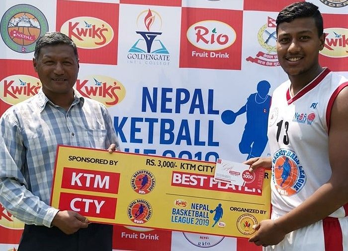 Manish KC (R) of Times International Club was declared man of the match for his 18 points, 9 rebounds &amp; 2 steals