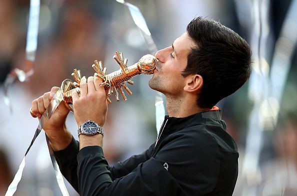 Djokovic kisses the 2019 Mutua Madrid Open trophy - his third overall in Madrid