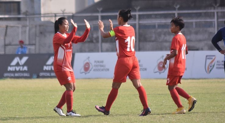 Manipur Police celebrate a goal against Baroda Football Academy