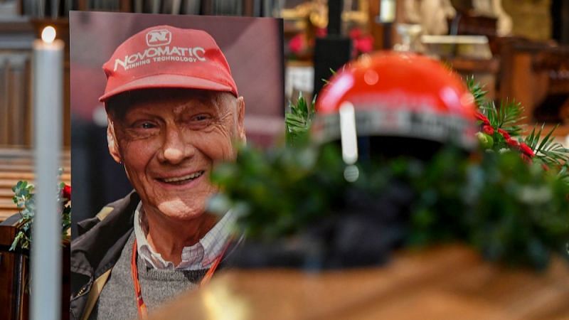 Lauda&#039;s famous red race helmet was placed above his coffin