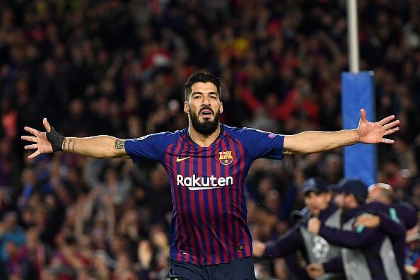 Luis Suarez celebrating after scoring against his former club Liverpool.