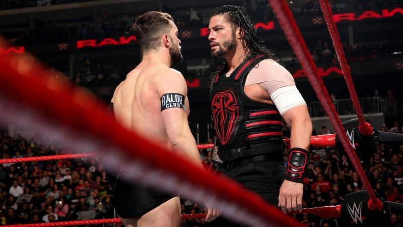 Image result for roman reigns and finn balor